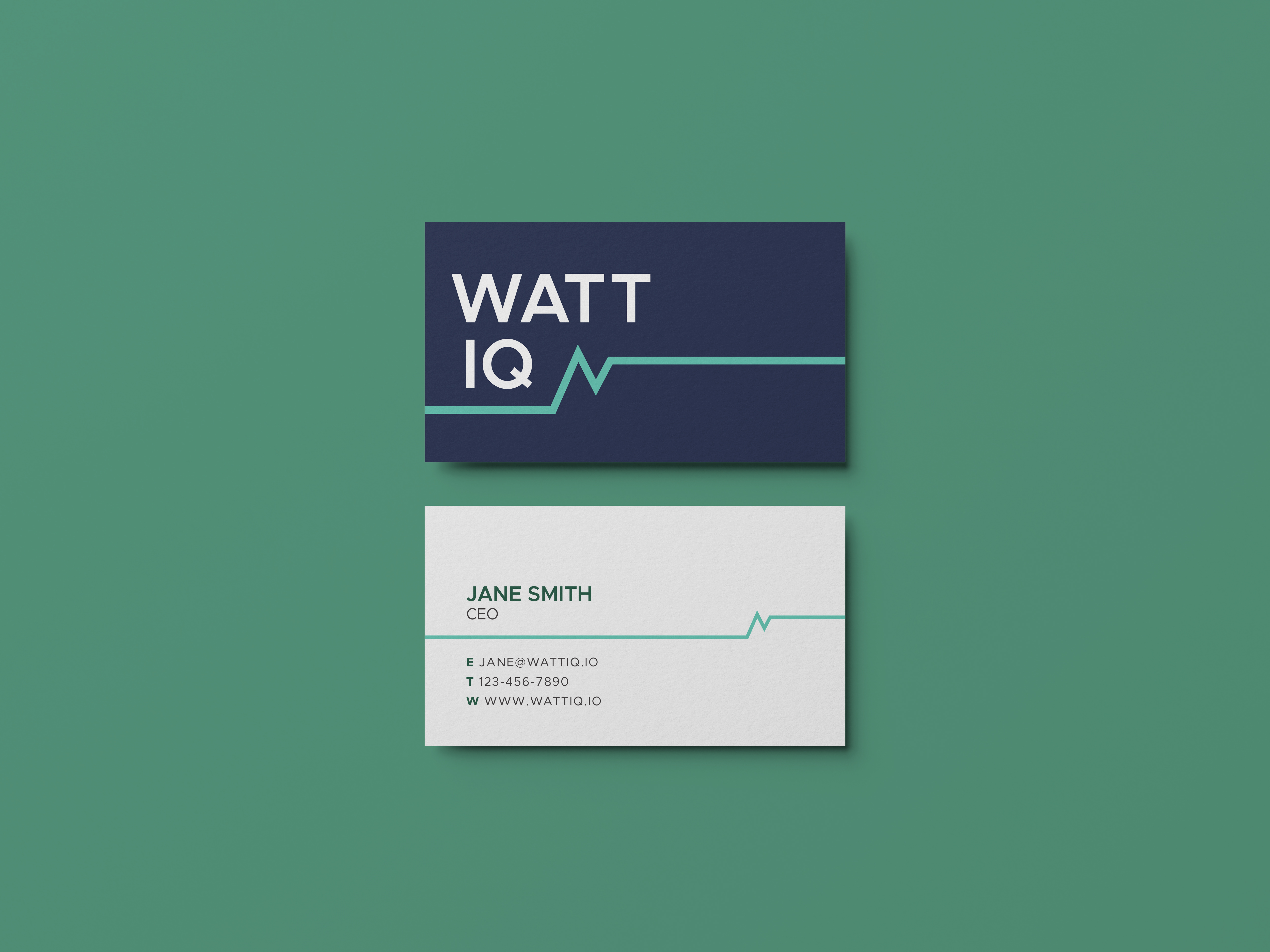 WattIQ buiness cards featuring their logo.