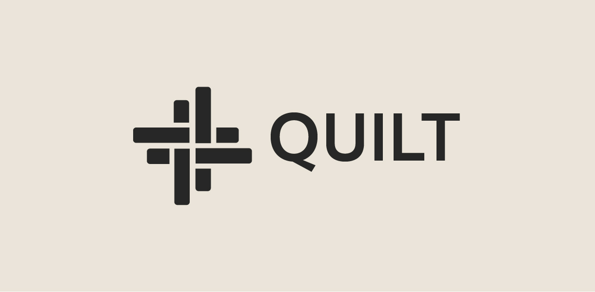Black QUILT logo on a black background.